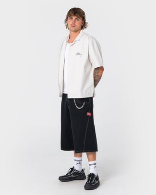 Man wearing Point Zero Engineered Jort in Black Out