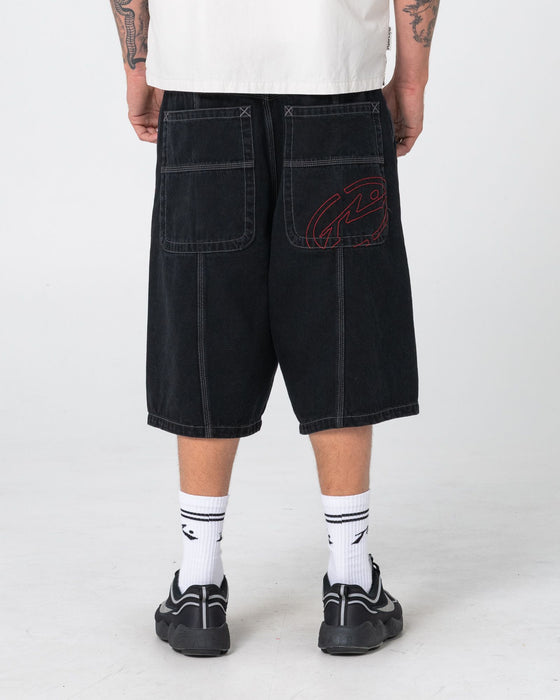 man-wearing-point-zero-engineered-jort-in-black-out