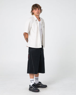 Man wearing Point Zero Engineered Jort in Black Out