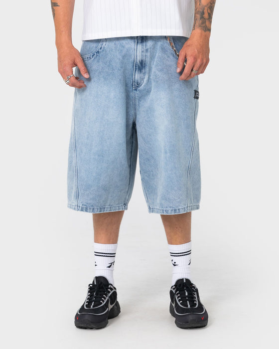 man-wearing-point-zero-engineered-jort-in-indigo-slub-blue