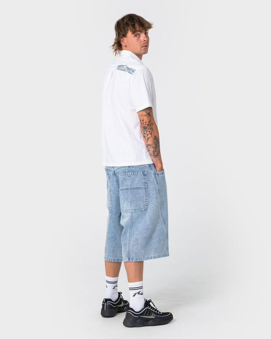 man-wearing-point-zero-engineered-jort-in-indigo-slub-blue