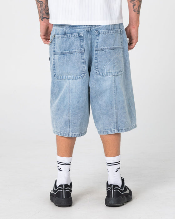 man-wearing-point-zero-engineered-jort-in-indigo-slub-blue