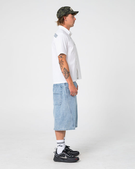 man-wearing-point-zero-engineered-jort-in-indigo-slub-blue