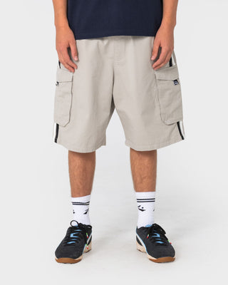 Man wearing 8-ball Elastic Cargo Short in Stone Grey
