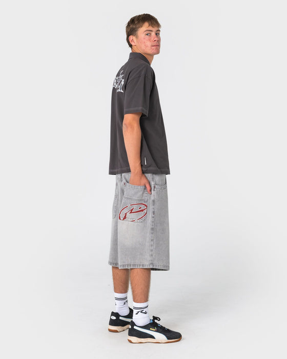 man-wearing-turbo-2-0-baggy-jort-in-storm