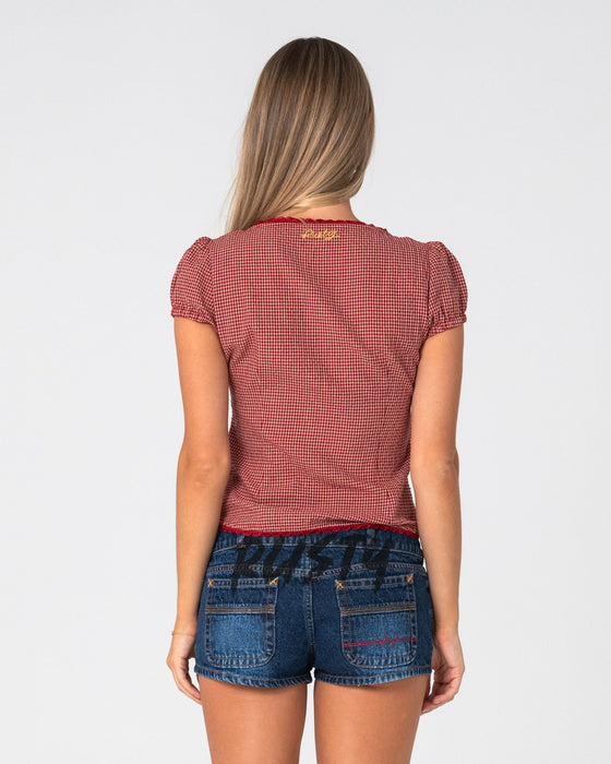 woman-wearing-hook-me-peggy-blouse-in-red-check