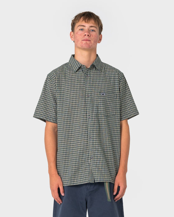 man-wearing-datsun-check-short-sleeve-shirt-in-dark-green