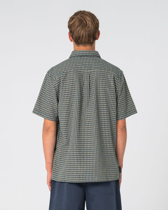 man-wearing-datsun-check-short-sleeve-shirt-in-dark-green