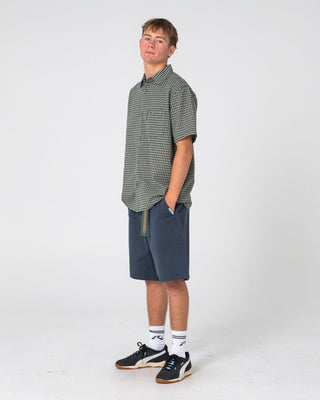 Man wearing Datsun Check Short Sleeve Shirt in Dark Green