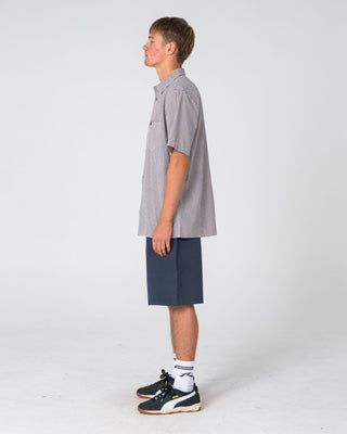 Man wearing Datsun Check Short Sleeve Shirt in Navy Blue