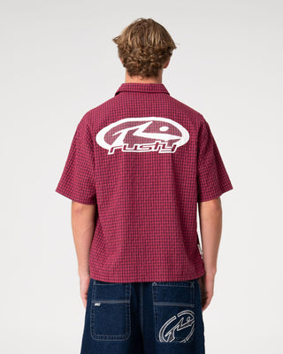 Man wearing Defender Dennis Short Sleeve Shirt in Vintage Red