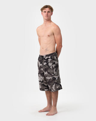 Man wearing Tropik 25 Baggy Camo Boardshort in Army Green