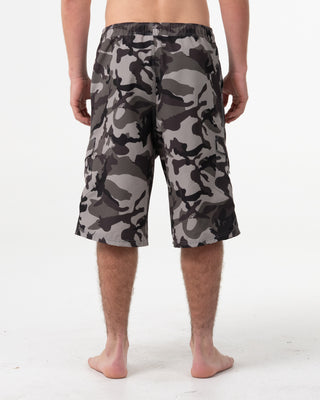 Man wearing Tropik 25 Baggy Camo Boardshort in Army Green