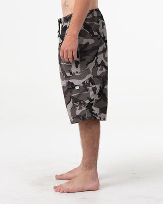 Man wearing Tropik 25 Baggy Camo Boardshort in Army Green