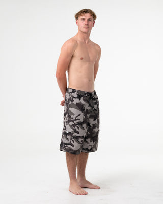 Man wearing Tropik 25 Baggy Camo Boardshort in Army Green