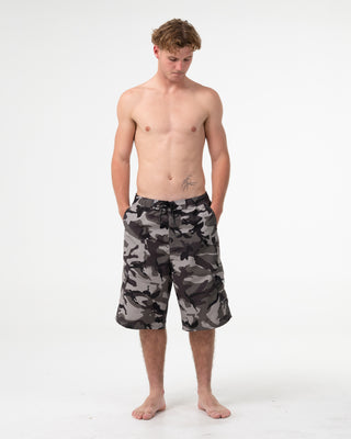 Man wearing Tropik 25 Baggy Camo Boardshort in Army Green