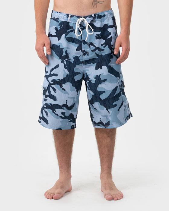 man-wearing-tropik-25-baggy-camo-boardshort-in-navy-blue