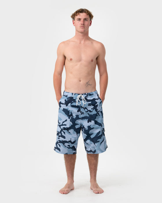 man-wearing-tropik-25-baggy-camo-boardshort-in-navy-blue