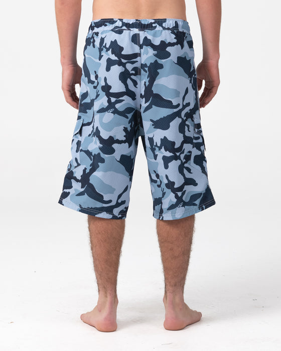 man-wearing-tropik-25-baggy-camo-boardshort-in-navy-blue
