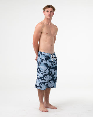 Man wearing Tropik 25 Baggy Camo Boardshort in Navy Blue
