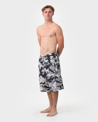 Man wearing Tropik 25 Baggy Camo Boardshort in Ultimate Grey