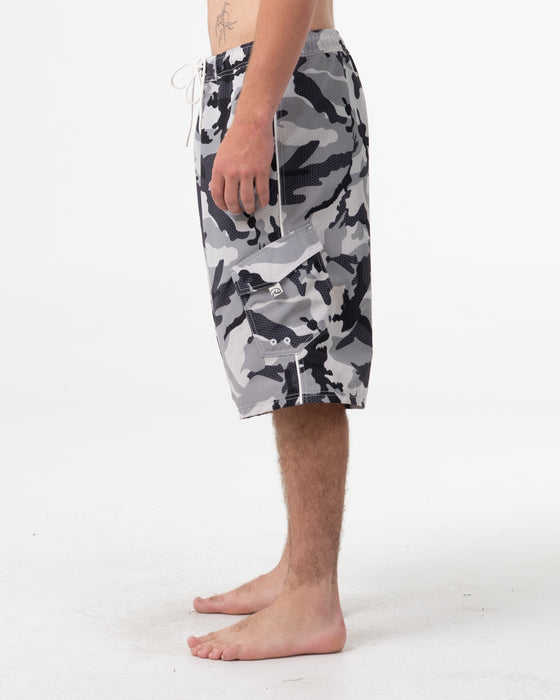 man-wearing-tropik-25-baggy-camo-boardshort-in-ultimate-grey