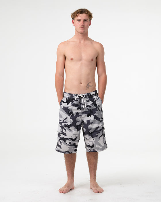 man-wearing-tropik-25-baggy-camo-boardshort-in-ultimate-grey