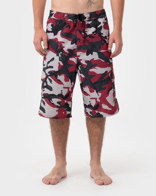 Man wearing Tropik 25 Baggy Camo Boardshort in Vintage Red