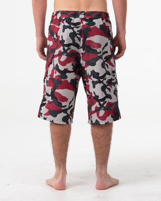 Man wearing Tropik 25 Baggy Camo Boardshort in Vintage Red