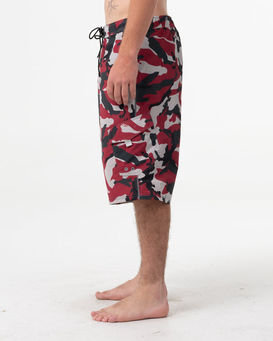man-wearing-tropik-25-baggy-camo-boardshort-in-vintage-red