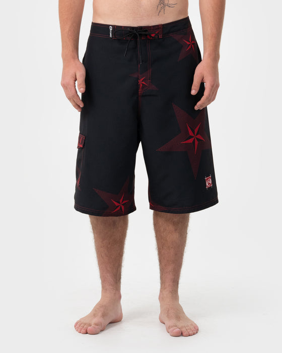 man-wearing-knievil-25-baggy-boardshort-in-black