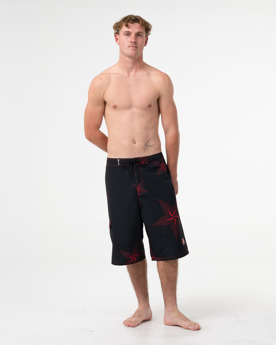 man-wearing-knievil-25-baggy-boardshort-in-black