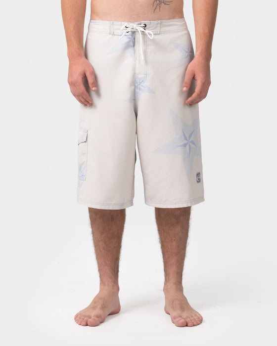 man-wearing-knievil-25-baggy-boardshort-in-ecru