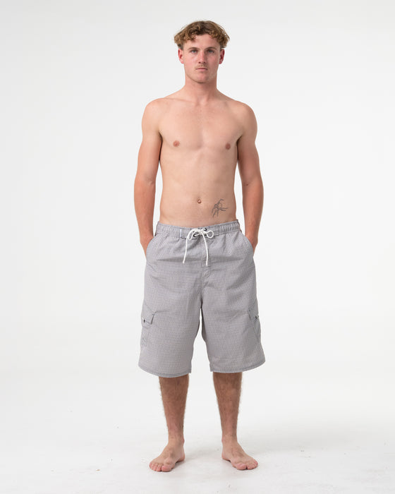 man-wearing-swish-25-baggy-boardshort-in-stone-grey
