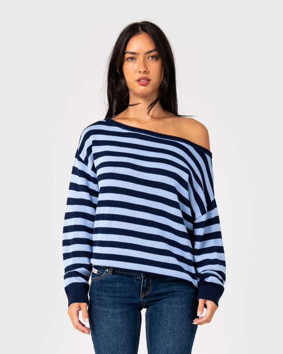 woman-wearing-stella-stripe-slouch-knit-in-navy-blue-retro-blue