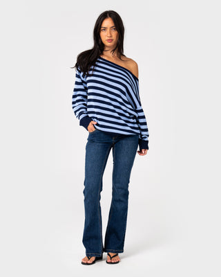Woman wearing Stella Stripe Slouch Knit in Navy Blue / Retro Blue