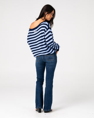Woman wearing Stella Stripe Slouch Knit in Navy Blue / Retro Blue