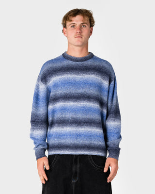 Man wearing Space Fluff Sweater in Atlantic Blue