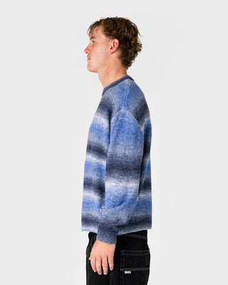 Man wearing Space Fluff Sweater in Atlantic Blue