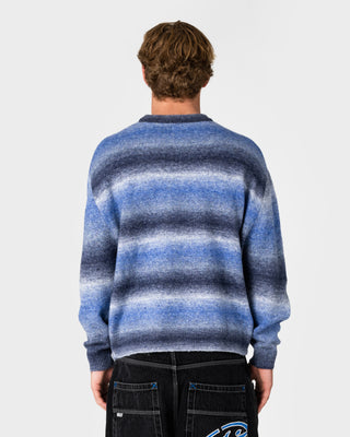 Man wearing Space Fluff Sweater in Atlantic Blue