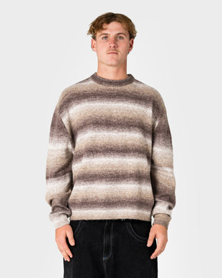 Man wearing Space Fluff Sweater in Brown