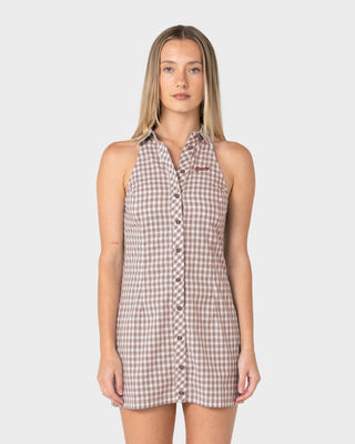 Woman wearing Missy May Sleeveless Mini Dress in Egret Chocolate