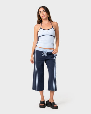 Woman wearing Maneater Fitted Halter Top in Retro Blue / Navy
