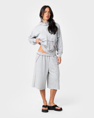 Woman wearing Servo Boxy Zip Through Fleece in Grey Marle