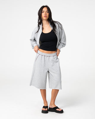 Woman wearing Servo Boxy Zip Through Fleece in Grey Marle