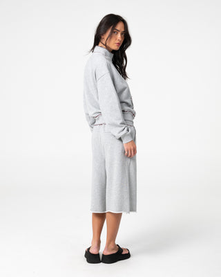 Woman wearing Servo Boxy Zip Through Fleece in Grey Marle