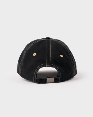 Woman wearing the Star Struck Skate Cap in Black
