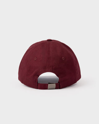 Woman wearing the Flipside Panel Dad Cap in Burgundy