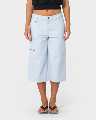 Woman wearing It Gyrl Low Rise Capri Cargo Pant in Pastel Blue