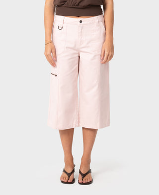 Woman wearing It Gyrl Low Rise Capri Cargo Pant in Pastel Pink